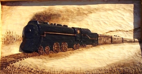 Hand Carved Train Relief  is sold Wood Carvings 