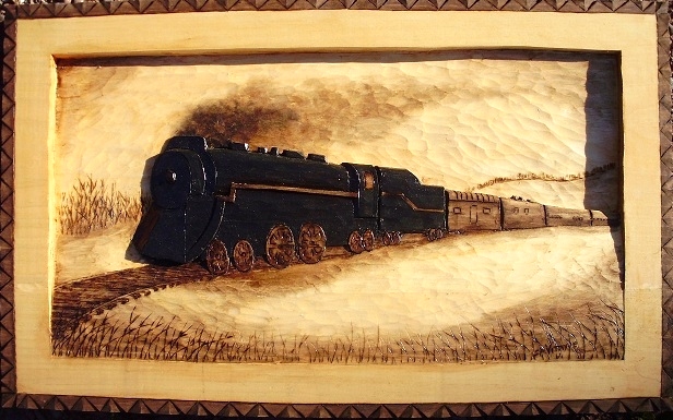 Hand Carved Train Relief  is sold Wood Carvings 