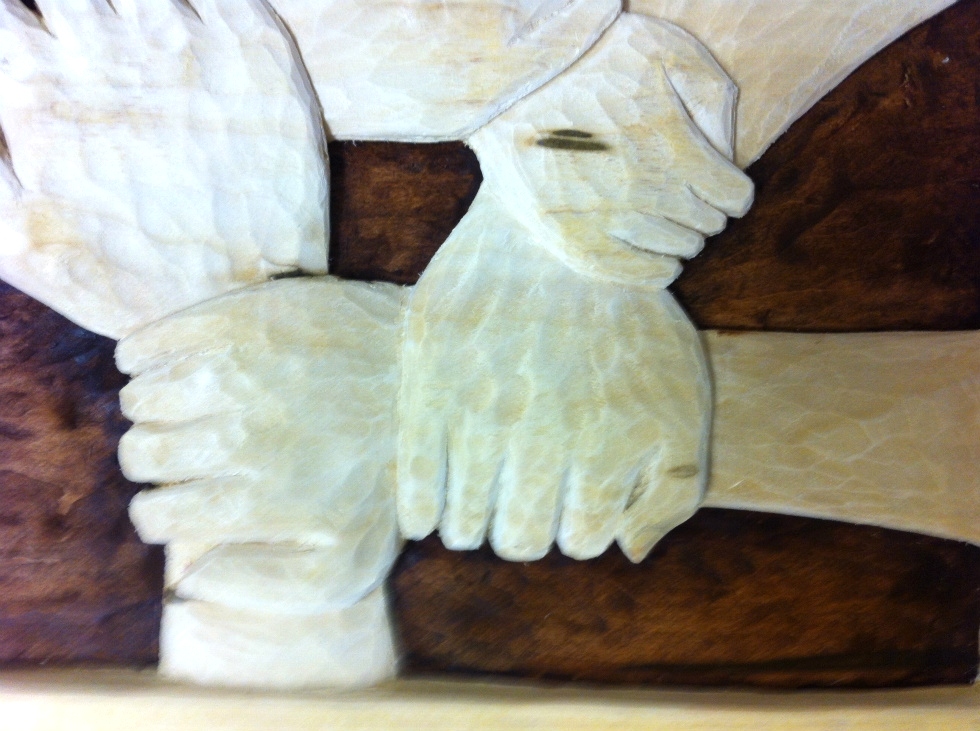 Hands Touching Hearts:  Wood Carvings 