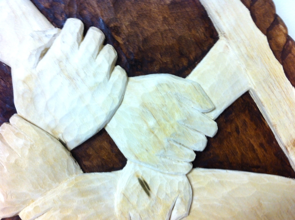 Hands Touching Hearts:  Wood Carvings 